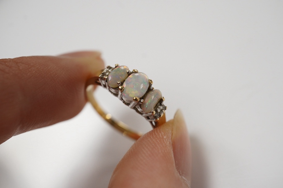 A 10k and three stone opal ring, with diamond set shoulders, an 18ct, sapphire and diamond three stone ring and a 1920's 18ct and plat. sapphire and diamond tablet ring, size P/Q, gross weight 8.1 grams Condition - poor